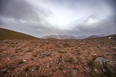 Beautiful mountains landscape of Scotland nature with beautiful evening cloudy sky.の写真素材