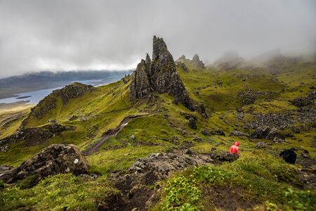 Old Man of Storr on the Isle of Skye in Scotland. Mountain landscape with foggy clouds.の写真素材