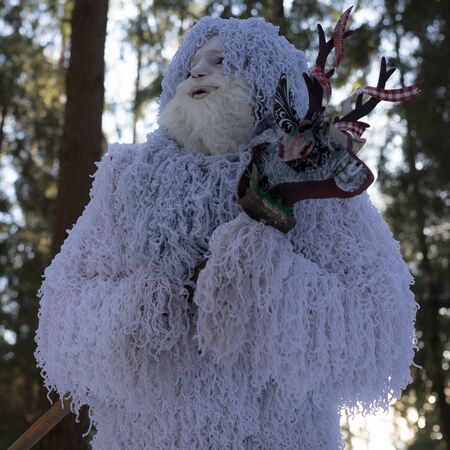 Yeti fairy tale character in winter forest. Outdoor fantasy photo.の写真素材