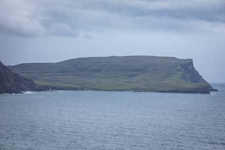 Waves breaking on coastal cliffs of Scotland