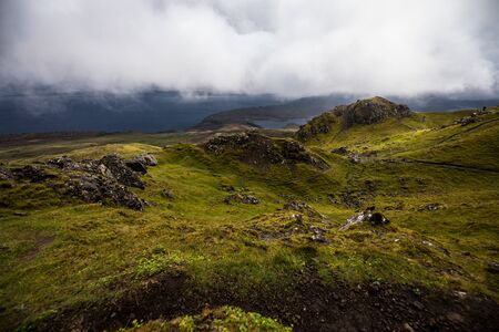 Old Man of Storr on the Isle of Skye in Scotland. Mountain landscape with foggy clouds.の写真素材