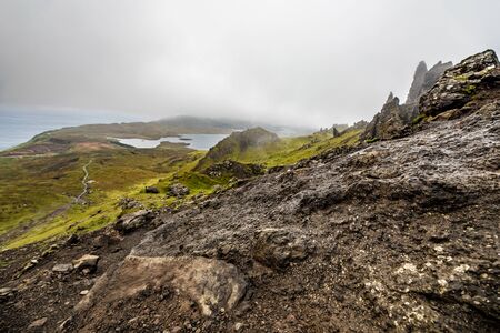 Old Man of Storr on the Isle of Skye in Scotland. Mountain landscape with foggy clouds