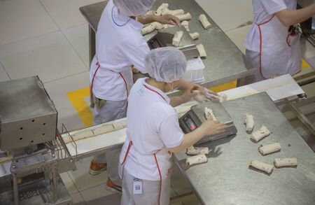 BEIJING, Ð¡HINA - JUNE 01, 2019: Industrial production of bread baking factory in China.