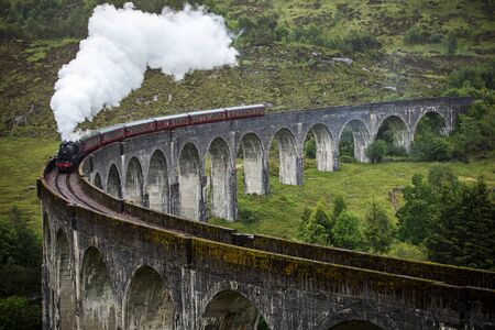 SCOTLAND, UNITED KINGDOM - MAY 30, 2019: The Hogwarts Express is the name of the train that makes a run between London, Kings Cross Station Platform 9.のeditorial素材