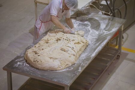BEIJING, Ð¡HINA - JUNE 01, 2019: Industrial production of bread baking factory in China.のeditorial素材