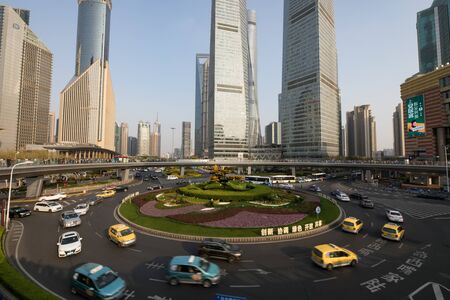 SHANGHAI, Ð¡HINA - APRIL 03, 2019: Modern central streets of Shanghai and high-rise buildings.