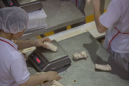 BEIJING, Ð¡HINA - JUNE 01, 2019: Industrial production of bread baking factory in China.