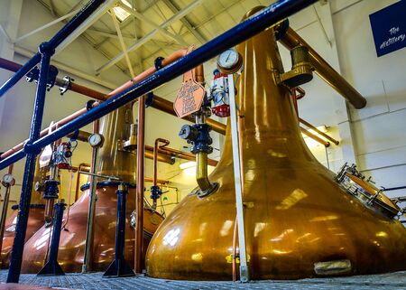 SCOTLAND, UNITED KINGDOM - MAY 30, 2019: Scottish traditional distillery producing alcoholic beverages.のeditorial素材