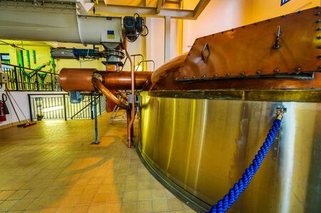 SCOTLAND, UNITED KINGDOM - MAY 30, 2019: Scottish traditional distillery producing alcoholic beverages.のeditorial素材