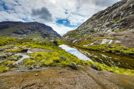 Picturesque landscape of a mountain river with traditional nature of Scotland