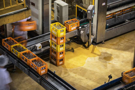 BEIJING, CHINA - JUNE 01, 2019: Carbonated drinks factory with view of production and bottles.のeditorial素材