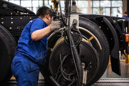 Workers in machinery factory in China
