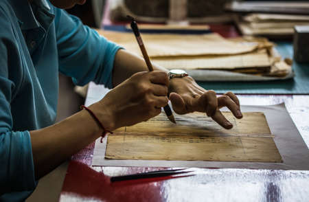 BEIJING, Ð¡HINA - JUNE 01, 2019: Traditional Chinese book and calligraphy restorer laboratory....
