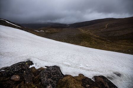 Beautiful mountains landscape of Scotland nature with beautiful evening cloudy sky.の写真素材