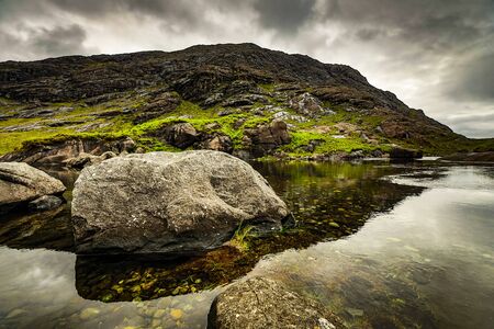 Beautiful scenic landscape of Scotland nature with mountain rocks.の写真素材