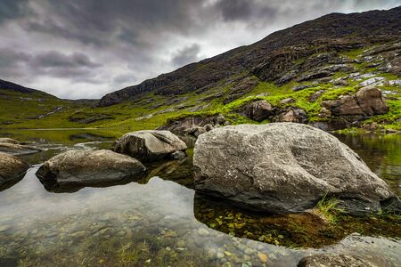 Beautiful scenic landscape of Scotland nature with mountain rocksの写真素材