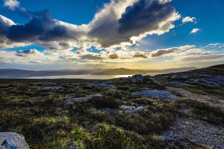 Beautiful scenic landscape of Scotland nature with beautiful evening sun set sky.の写真素材