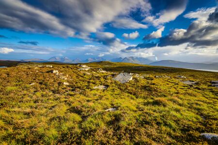 Beautiful scenic landscape of Scotland nature with beautiful evening sun set skyの写真素材