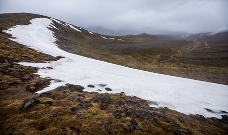 Beautiful mountains landscape of Scotland nature with beautiful evening cloudy skyの写真素材