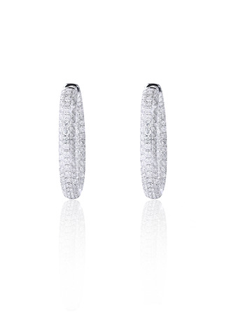 Pave Diamond Hoop Earrings isolated on white with a reflectionの写真素材