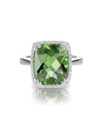 Emerald diamond helo engagment cocktail ring isolated on whiteの写真素材