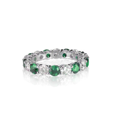 green emerald and diamond wedding band ring isolated on whiteの写真素材