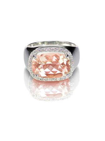 Morganite diamond halo engagement ring isloated on whiteの写真素材