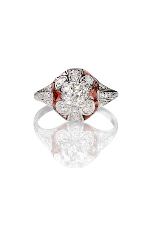 Vintage diamond ring with ruby accents isolated on whiteの写真素材