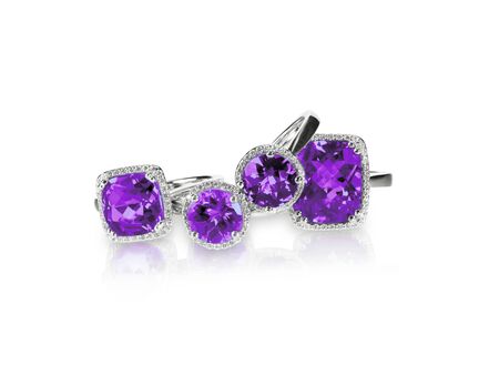 Set of purple amethyst ametrine rings gemstone fine jewelry. Group stack or cluster of multiple gemstone diamond rings.の写真素材