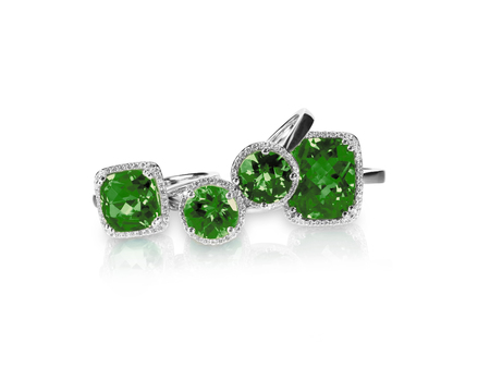 Set of green emerald rings gemstone fine jewelry. Group stack or cluster of multiple gemstone diamond rings.の写真素材