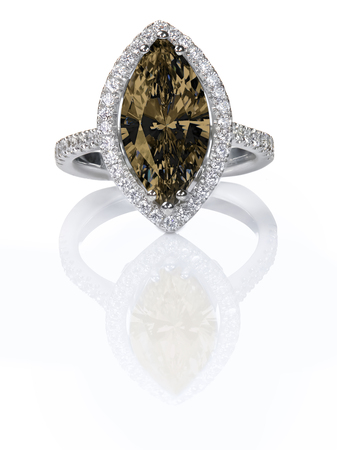Beautiful Chocolate brown fancy Diamond Engagement ring. Gemstone Marquise cut surrounded by a halo of diamonds.の写真素材