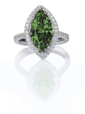 Green Emerald Beautiful Diamond Engagement ring. Gemstone Marquise cut surrounded by a halo of diamonds.の写真素材