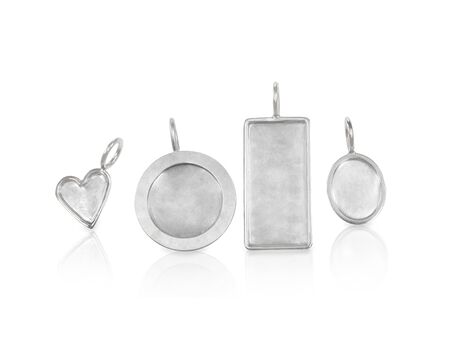 Silver undecorated charms for necklaces in various sizesの写真素材