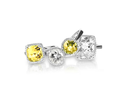 Set of yellow topaz citrine rings gemstone fine jewelry. Group stack or cluster of multiple gemstone diamond rings.の写真素材