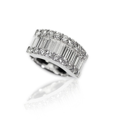 Diamond encrusted engagment wedding anniversary ring with Emerald Cut Diamonds channel setの写真素材