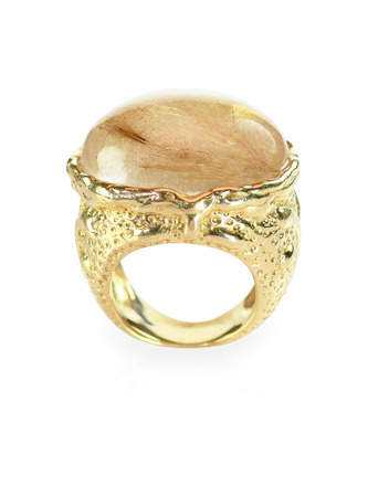Rutilated quarts and gold ring isolated on whiteの写真素材