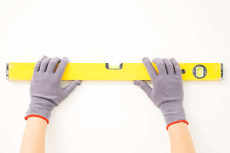 Measurement of a white wallの写真素材