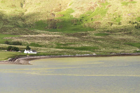 Rainbow on the Loch Ainort on the isle of Skyeの写真素材