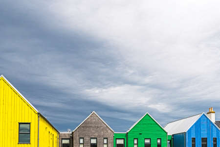 view of colored houses in John O 'Groats village in Scottish Highlandsの写真素材