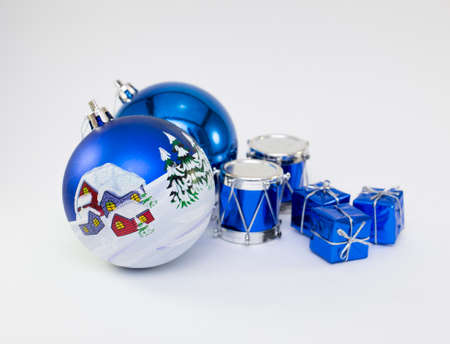 Christmas card with balls and decorations on a dark woodenの写真素材