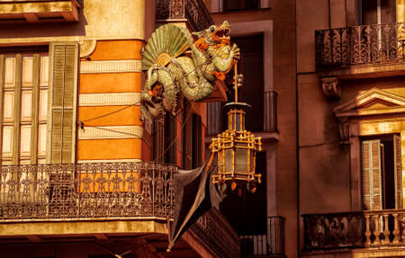 BARCELONA, circa 2015 - A telephoto shot of architectural detail of a street lamp in Las Ramblas avenue, Barcelona, Catalonia, Spainのeditorial素材