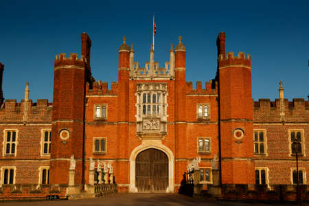 LONDON, circa 2016 - Medium shot of the facade of the Hampton Court Palace with the Union Jack in London, England, UKのeditorial素材