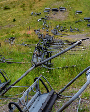 Abandoned military equipment on the top of the mountain in summer