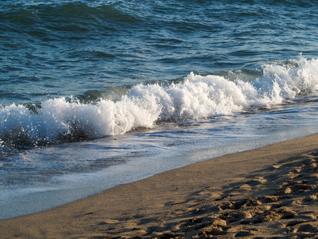 Waves on the shore of the Baltic Sea in Kolobrzegの写真素材