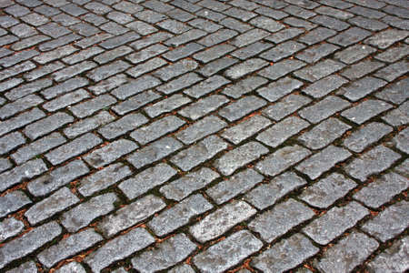 Old road made of rock tilesの写真素材