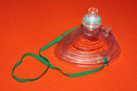 A CPR bag isolated on red background.の写真素材