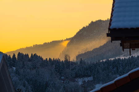 Beautiful winter sunset in the mountains near Oberstdorf, Allgau, Germanyの写真素材