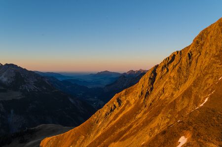 Beautiful autumn sunset in the mountains at Rappensee hut near Oberstdorf, Allgau, Germanyの写真素材