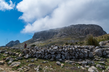 Female hiking in the mountains of Tramuntana, Mallorca, Balearic Islands, Spainの写真素材