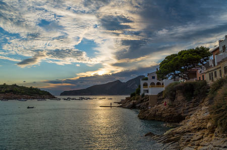 Beautiful sunset in Sant Elm at GR 221 in the Tramuntana mountains with island Sa Dragonera in the background, Mallorca, Spainの写真素材